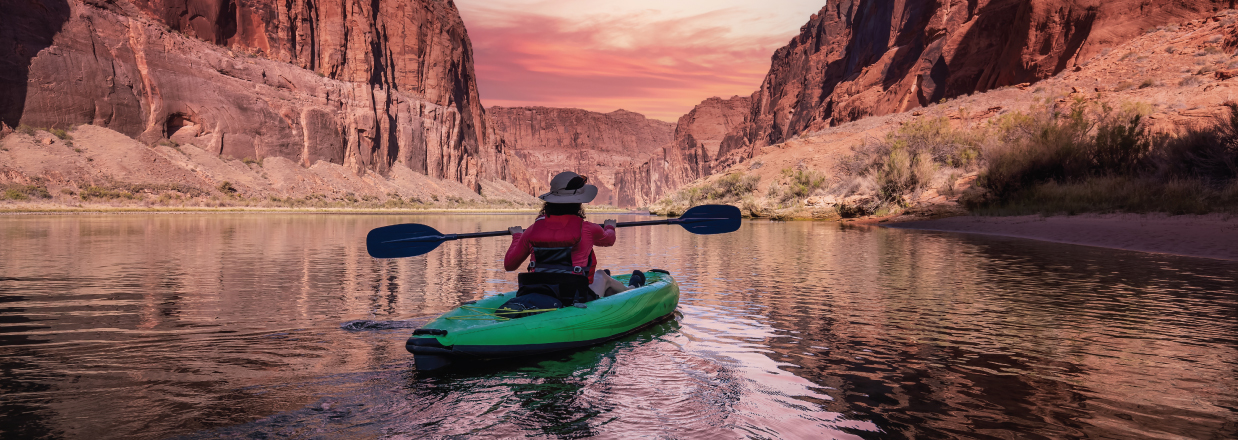 person kayaking in the desert